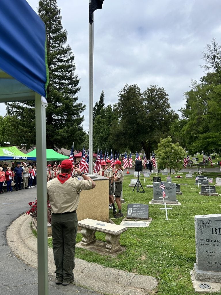 boy scouts dedicating new flag